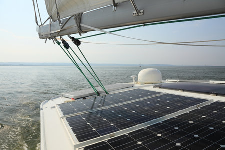 Solar charging batteries aboard a sail boat Photovoltaic panels energy conceptの写真素材