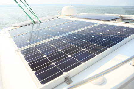 Solar charging batteries aboard a sail boat Photovoltaic panels energy concept