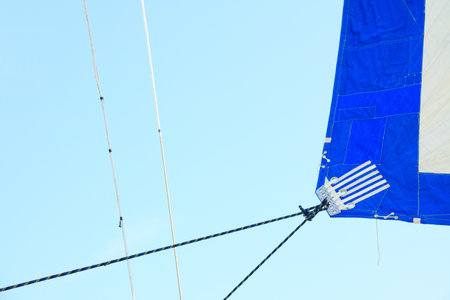 Sails and mast in the blue skyの写真素材