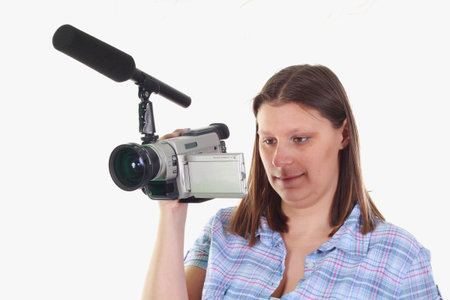 beautiful girl with videocameraの写真素材