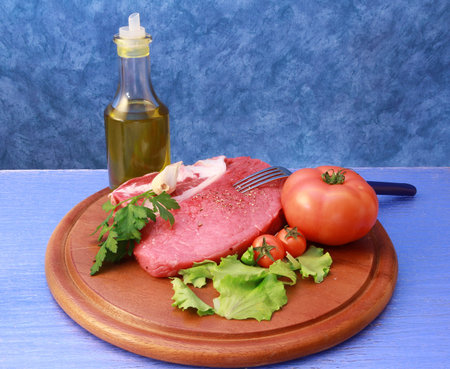 raw meat on cutting boardの写真素材