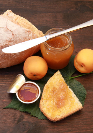 homemade jam on a slice of bread close up の写真素材