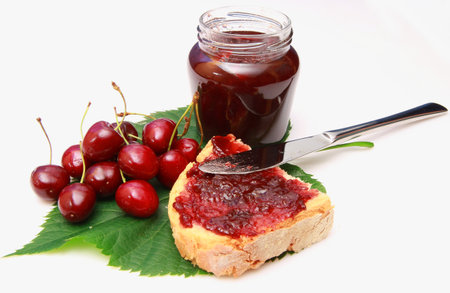 Breakfast of cherry jam on toastの写真素材