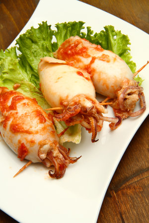 stuffed calamari with tomatoesの写真素材