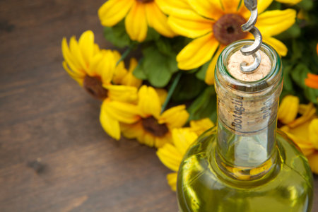 Opening a bottle of white  wineの写真素材