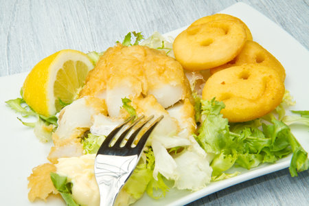Fried cod fillets with chips の写真素材