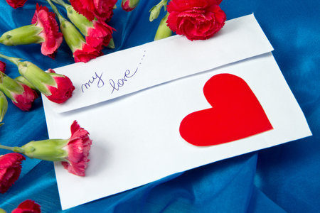 Spring letter and red carnation