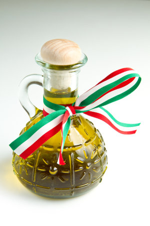 italian olive oil isolated on whiteの写真素材