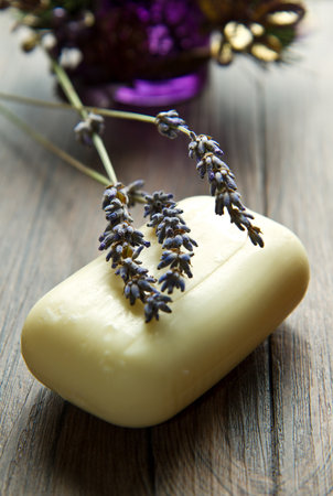 lavender soap with flower on wooden backgroundの写真素材