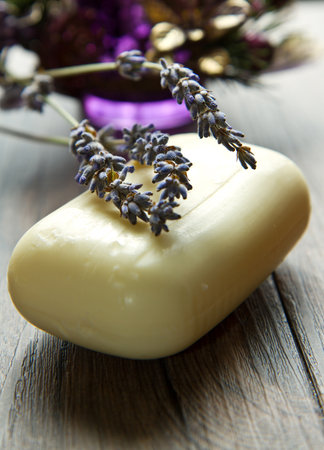 lavender soap with flower on wooden backgroundの写真素材