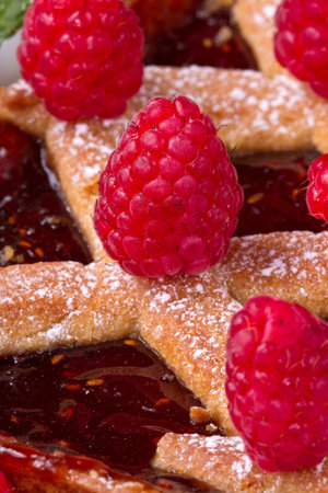 a raspberries tart with fresh fruits 