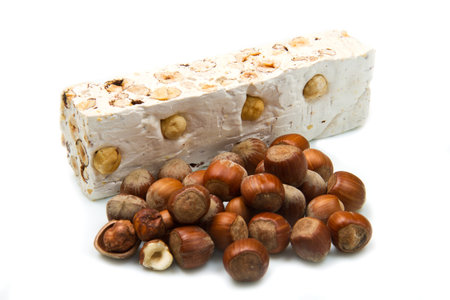 nougat with hazelnut on white backgroundの写真素材