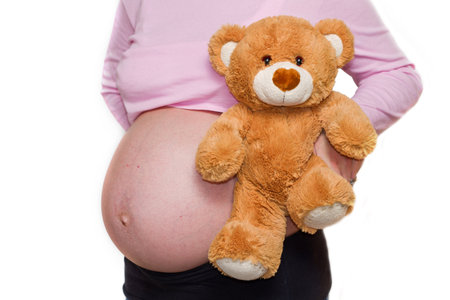 Teddy bear and belly の写真素材