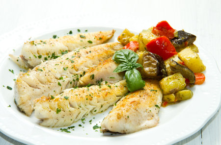 Tasty healthy fish fillet with vegetablesの写真素材