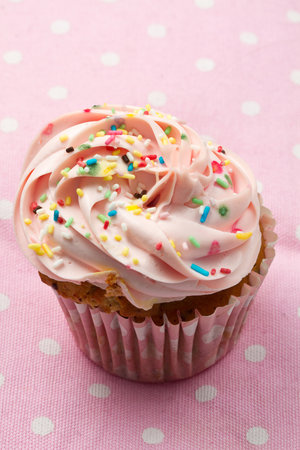 Delicious  cupcake with strawberry frostingの写真素材