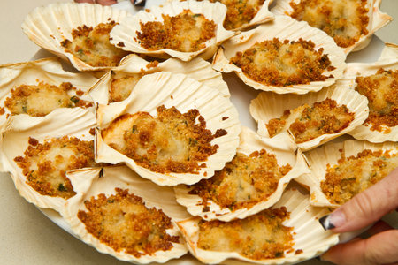 dish with scallops au gratinの写真素材