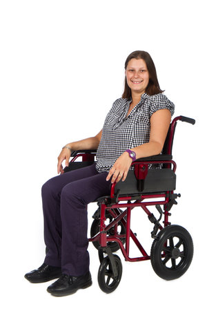 Smiling female patient in a wheelchairの写真素材