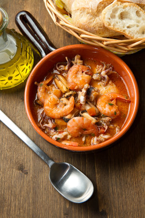 Bowl of fresh seafood soupの写真素材