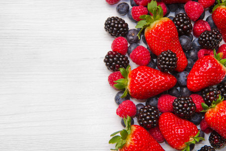 Berry over white  Wood  Strawberries, Raspberries, Blueberry