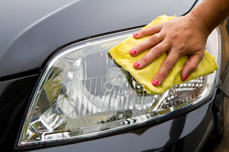 Hand with a wipe the car polishing の写真素材