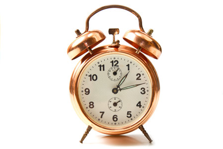  old style alarm clock isolated on white 