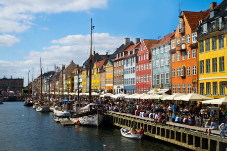 Nyhavn in Copenhagen, Denmark - one of the most popular tourist places of the Danish capital. 