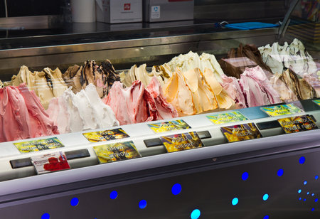 Mixed trays of ice cream in ice-cream shop 