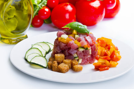 tuna tartar with fresh zucchini and pepperの写真素材