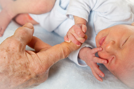 Hand of a newborn babyの写真素材
