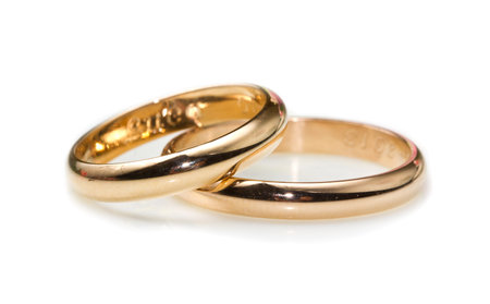 golden rings isolated on white backgroundの写真素材