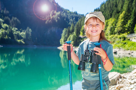 Smiling young woman hiker hiking outdoorsの写真素材