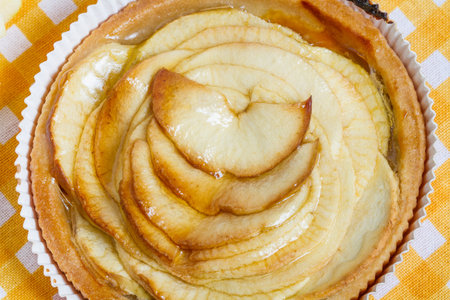 apple pie on white wood background
