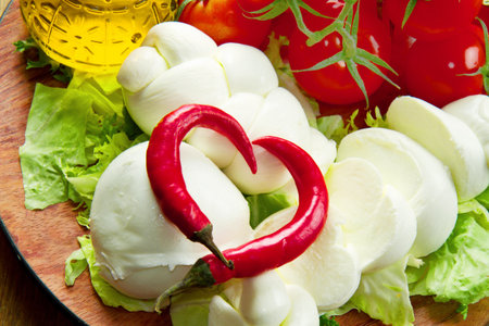 A fresh italian mozzarella  with tomato