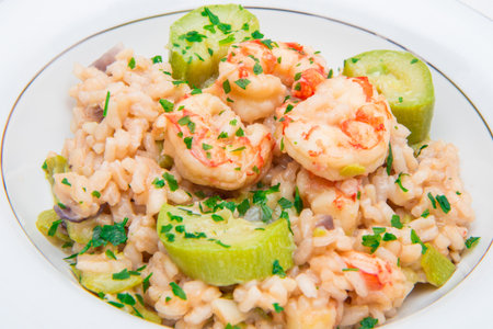 dish with risotto with prawns and zucchiniの写真素材