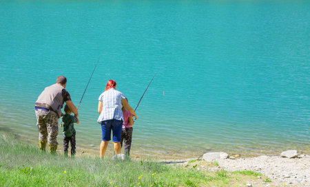 happy family fishing togetherの写真素材