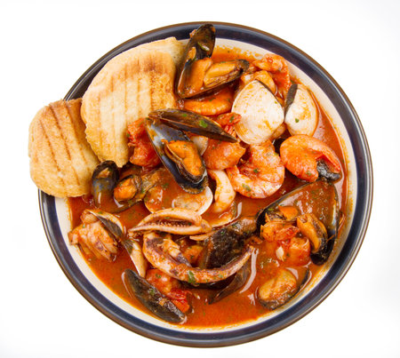 fresh seafood soup with roasted breadの写真素材