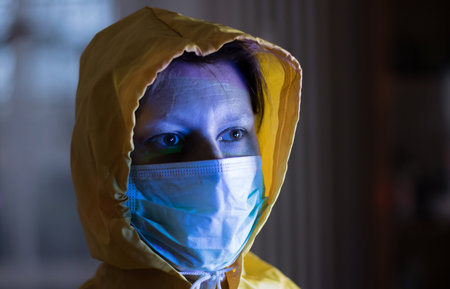 woman with medical mask coughing. mask to protect her from virus .woMan with mask for Coronavis.の写真素材