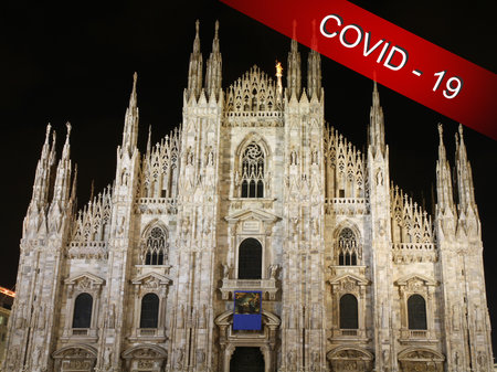 Milan cathedral as a symbol of the city hit hard by the covid-19 pandemic.  Coronavirus COVID-19 world outbreak conceptの写真素材