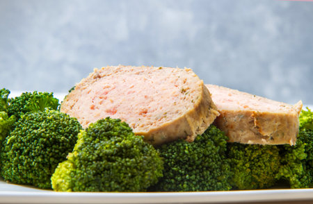 plate of meat loaf with broccoliの写真素材