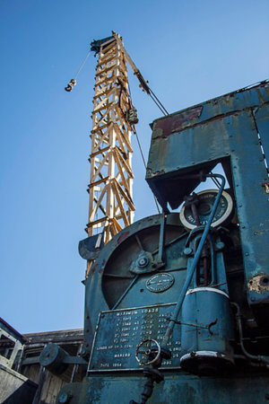 View of old diesel crane in a scrap yardの写真素材