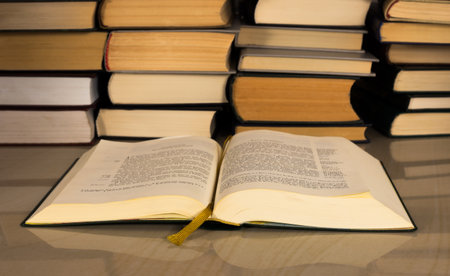 Gospel the New Testament and other books on a marble tableの写真素材