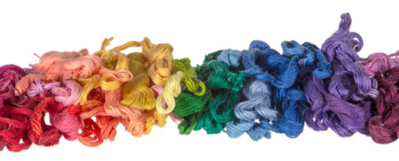 skeins of multicolored threads for embroidery - muline. on a white background