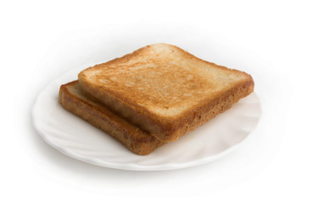 toasted bread on a plate isolated white background