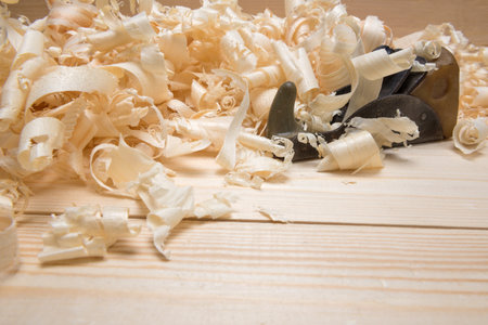 Hand jointer and shavings on pine boardsの写真素材