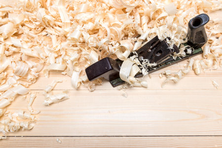 Hand jointer and shavings on pine boardsの写真素材