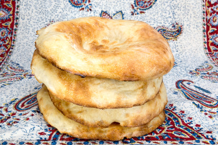 wheat bread in the form of tortillas from Asia, baked in a clay ovenの写真素材