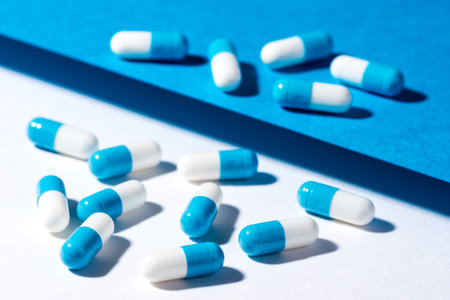 medicine capsule on a white and blue background