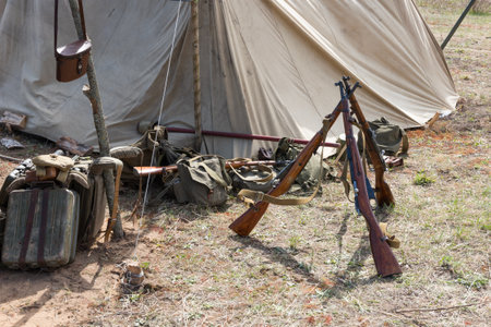 Weapons and equipment in a military camp during the Second World War. Historical Reconstructionの写真素材