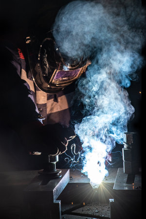 electric arc welding of metal structures at the factoryの写真素材