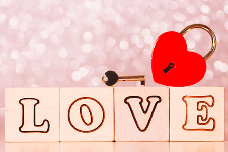 concept of love, the inscription love from wooden cubesの写真素材